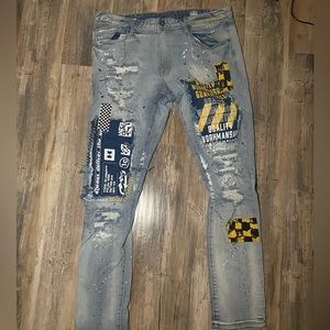 Ripped denim jeans.